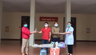 NAPA officers giving Lao students medical masks, sanitizers, sanitary equipment to prevent and control the epidemics and necessities for COVID-19 prevention and sosial isolation