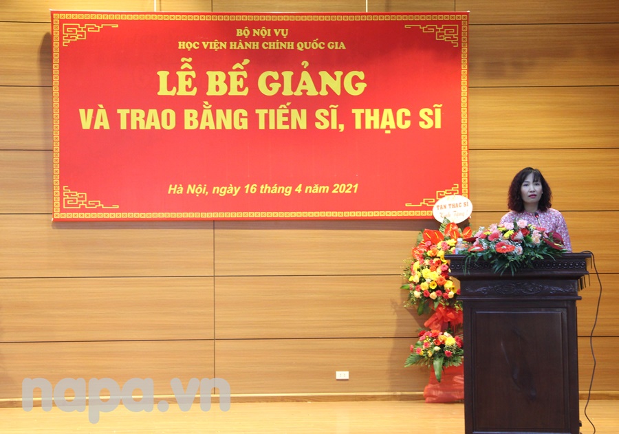 Ms. Do Thuan An, Head, Division of Graduate Training Management  announcing the decision of conferment of master degrees