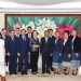 A group photo of Minister Pham Thi Thanh Tra, Director Phu-vong On-kham-sen, and meeting participants.