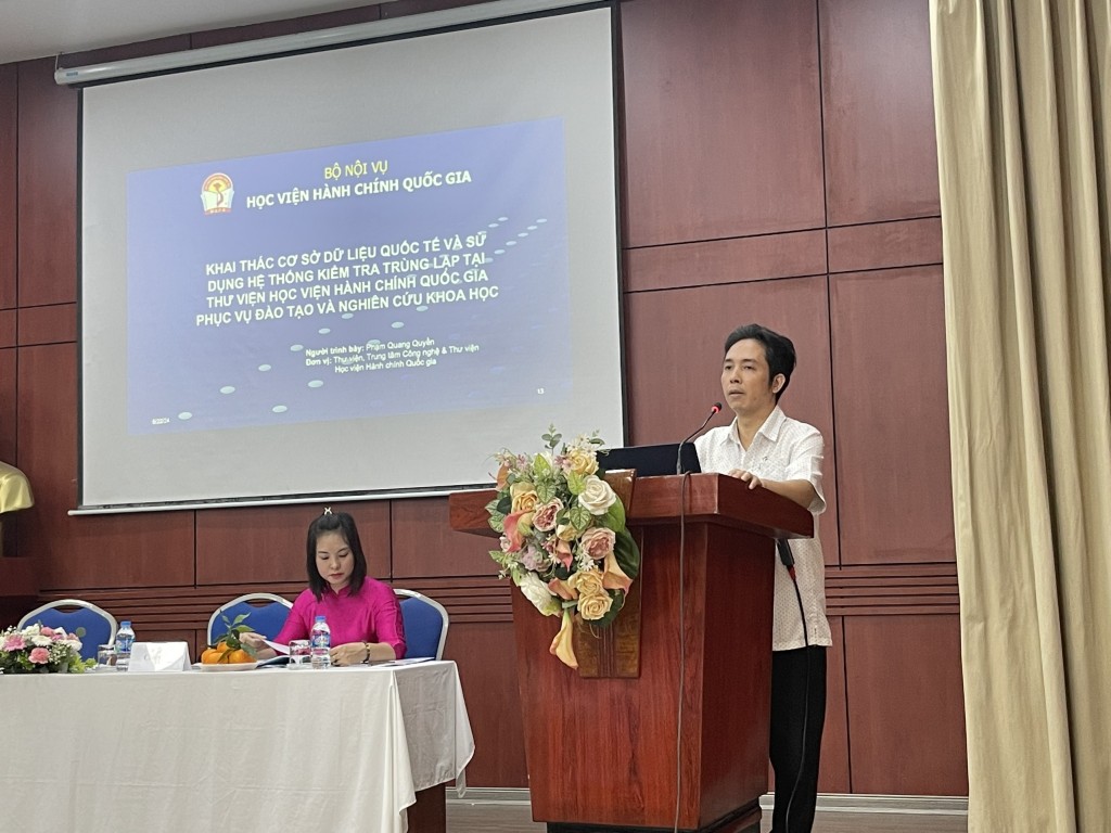 Dr. Pham Quang Quyen, Head of the Library, at the Seminar.