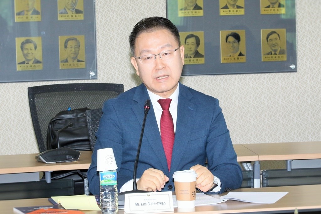 NHI President Kim Chae-Hwan at the working session.