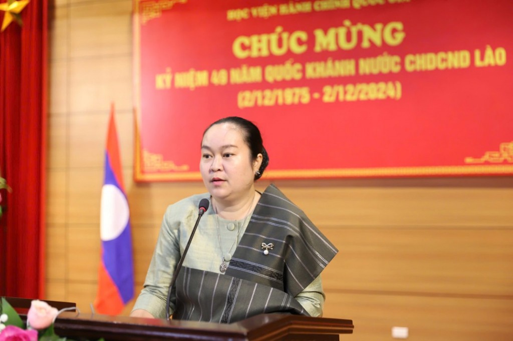 Ms. Phonvilay Sypasert, Second Secretary of the Lao Embassy in Viet Nam, speaks at the Celebration of Lao National Day.